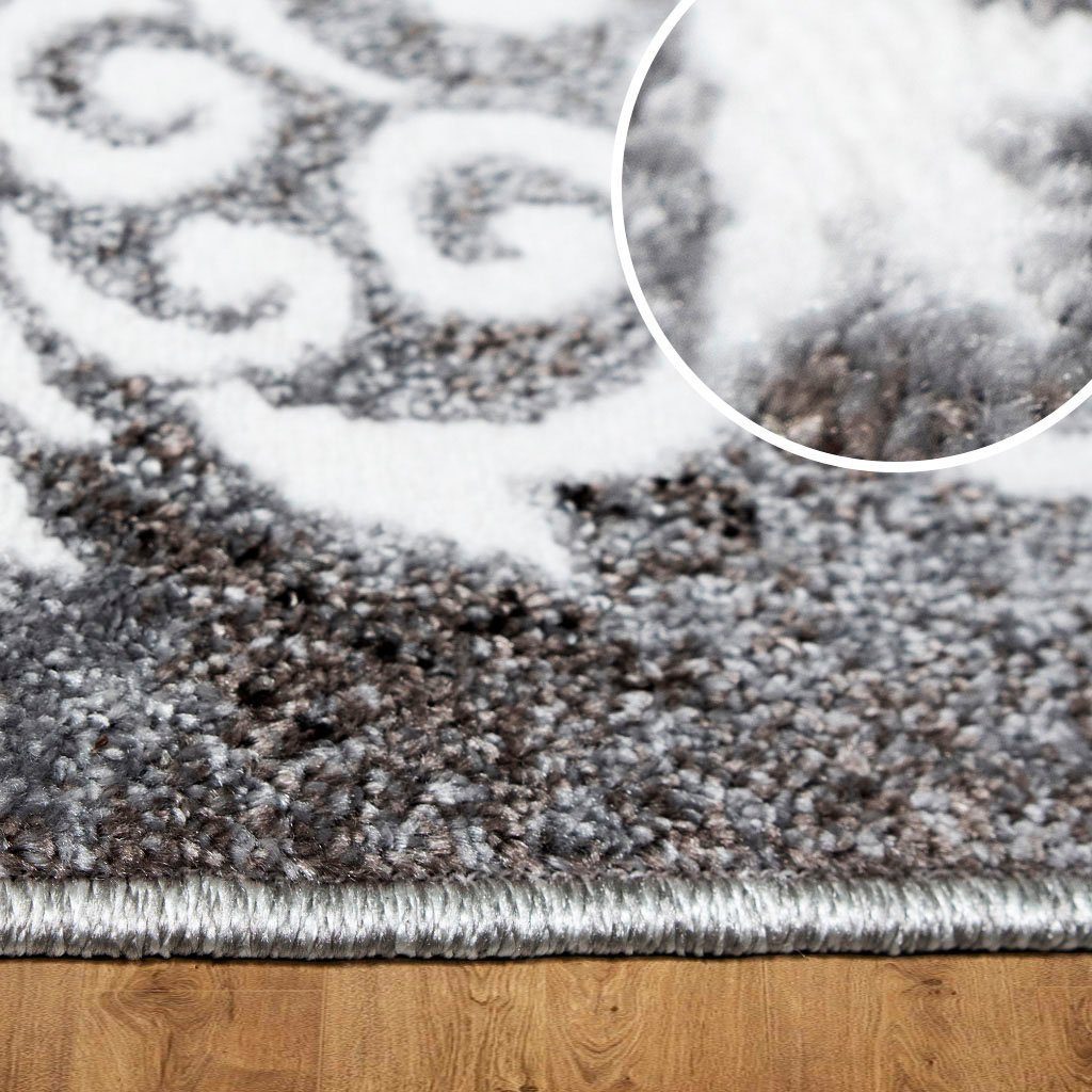 szary dywan ze wzorem